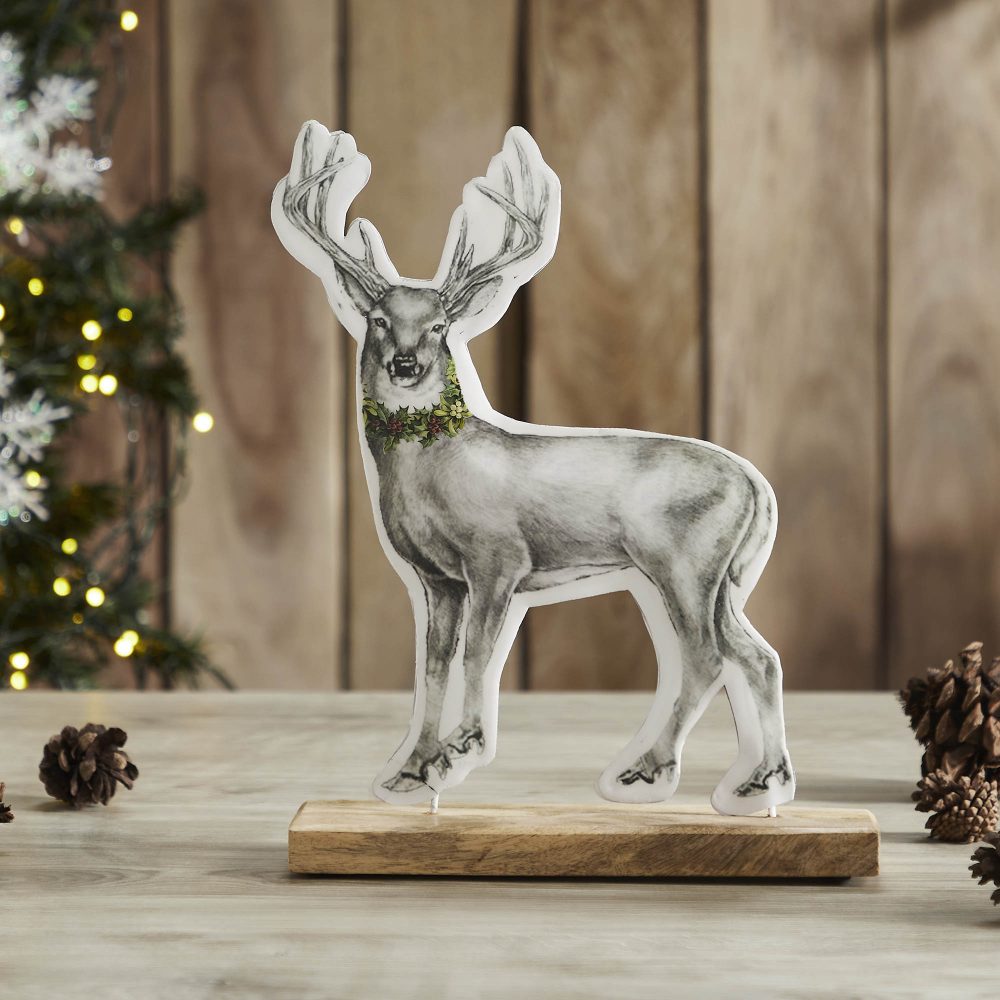 Reindeer With Wreath Figurine 11.5x9x2.5